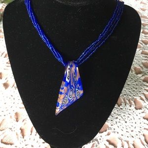 Blue Multi Strand Necklace with Glass Pendant